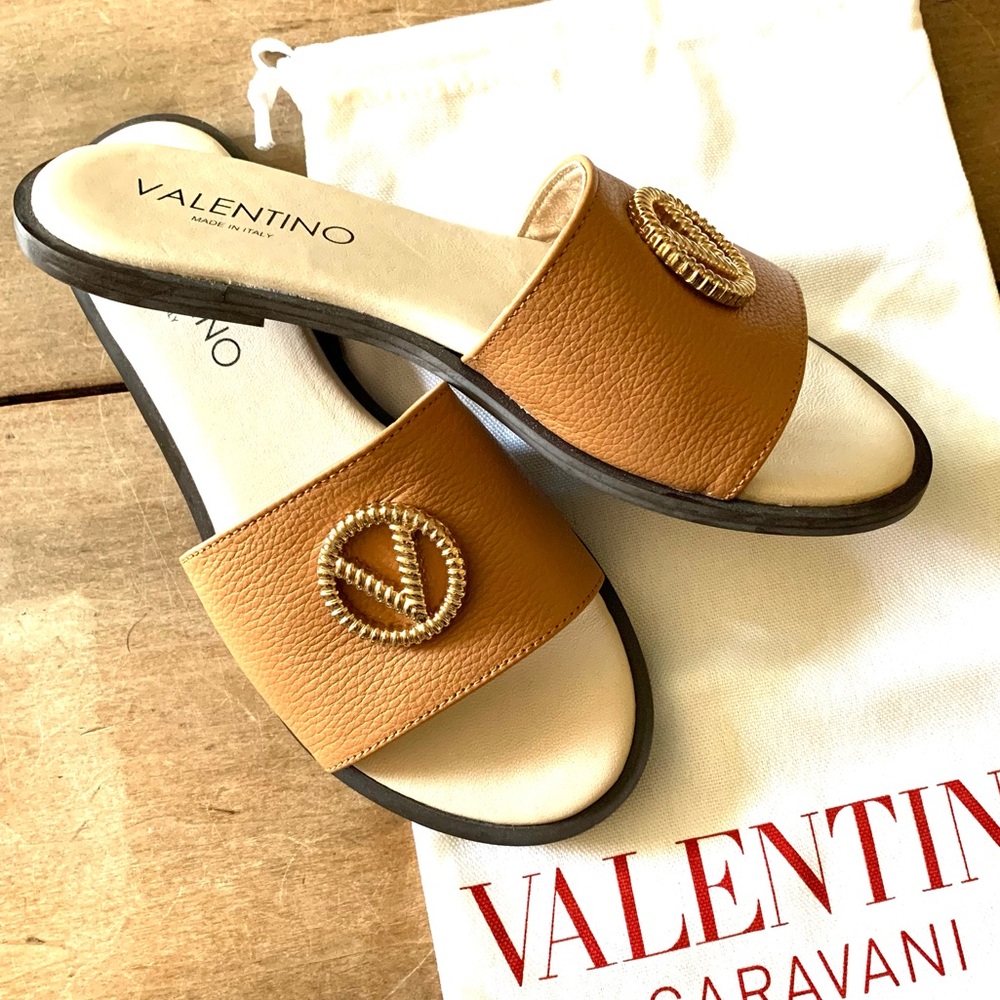 Valentino slides, pebbled leather flats, gold tone monogram embellishment, 37 ￼